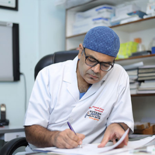 Dr. Priyank Garg